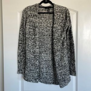Mid length black and white cardigan, size small